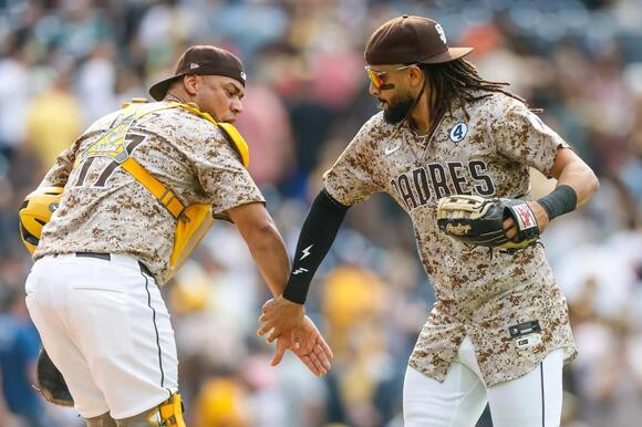 Padres Rally Late—McCutchen Makes History, Suarez Slams the Door