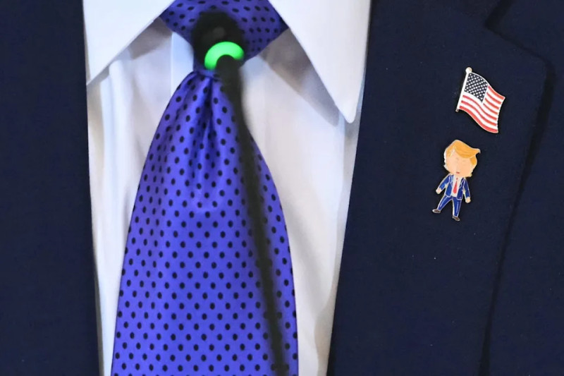 Unveiling the Controversy: The Happy Trump Pin Phenomenon