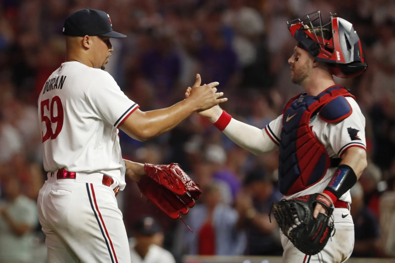 Chilly Cheers and Hot Dogs: Twins Fans Kick Off the Season at Target Field