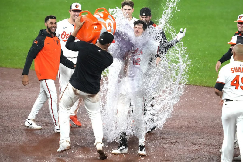 Baltimore Orioles Face Off Against Phillies in Rain-Halted Game