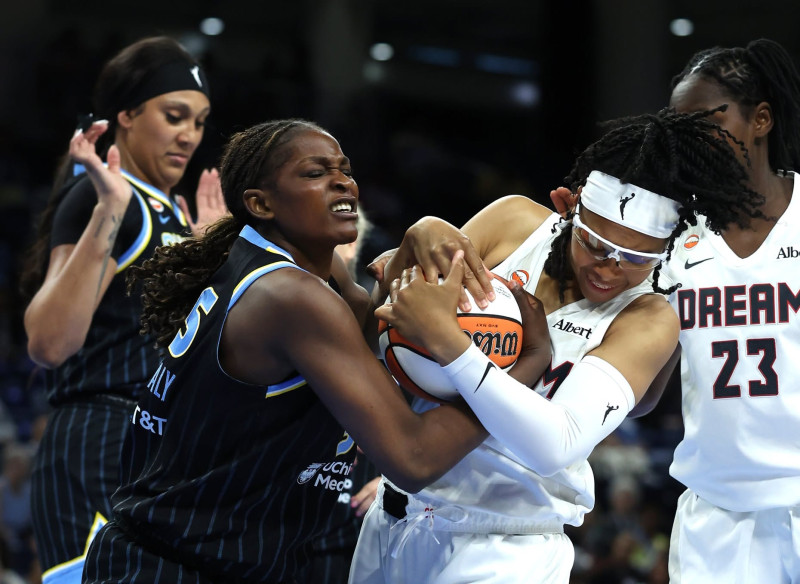 Emotional Showdown: Chicago Sky's DiJonai Carrington Ejected for Flagrant Foul on Sophie Cunningham, Sparks Controversy, and Social Media Storm