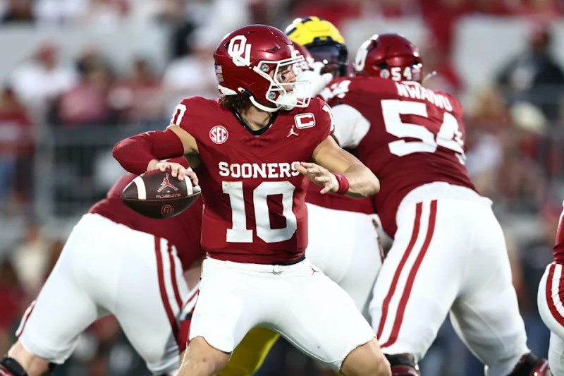 Oklahoma Sooners and Michigan Wolverines Prepare for Gridiron Showdown