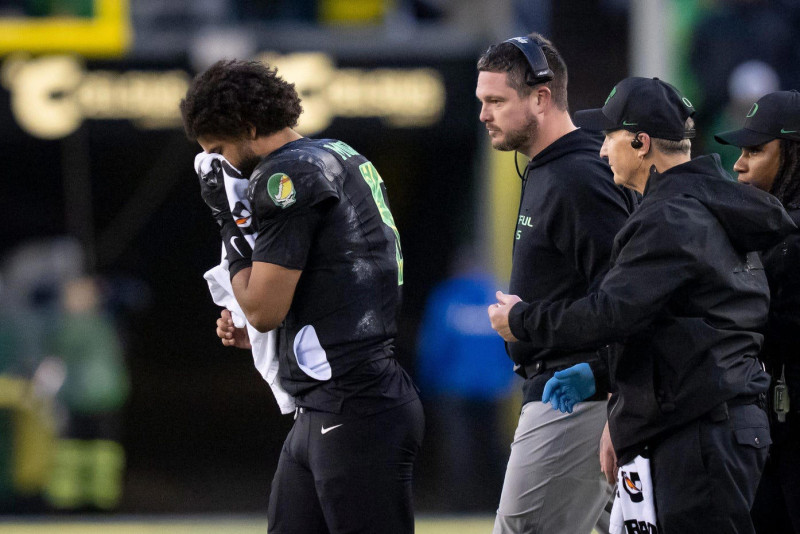 Dante Moore's Sudden Injury Casts Shadow Over Team Dynamics