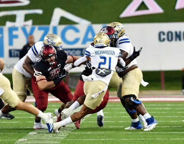 Navy Midshipmen Clash with the Golden Hurricane in a Late-Season Showdown
