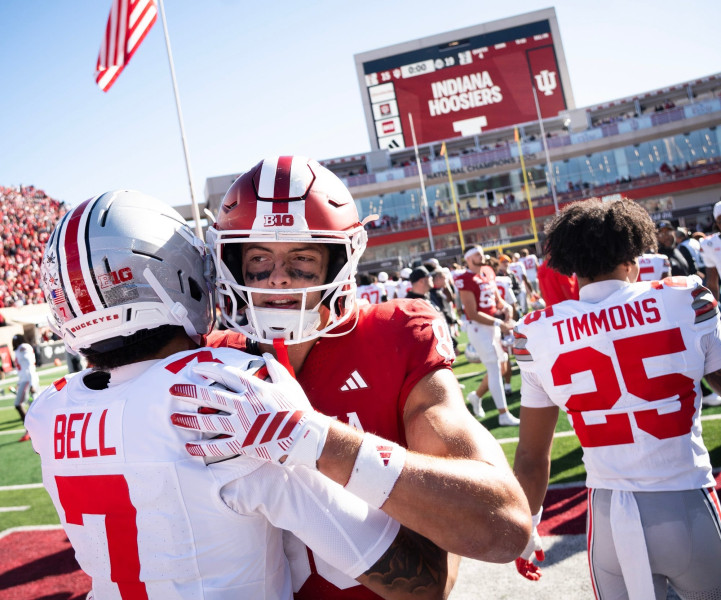 Indiana's Charlie Becker apologizes to Ohio State's Ryan Day